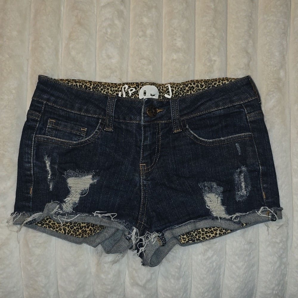 Denim Shorts with Leopard print pockets. Dark Denim from SPJ. Size Small.